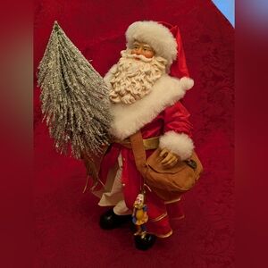 Festive Santa Claus Figurine with Red Outfit and White Accents